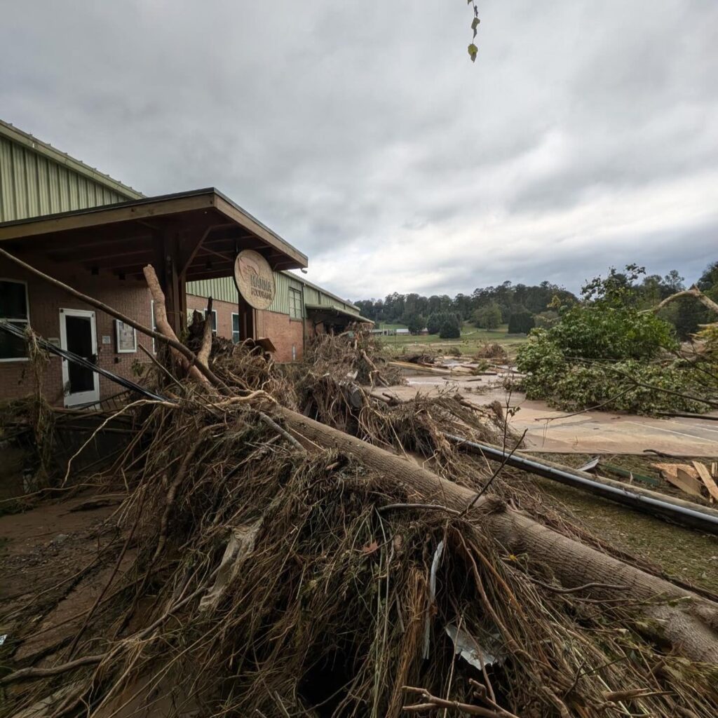 An image of the front of the MANNA Food Bank warehouse following the destruction left by Hurricane Helene